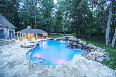 Custom Inground Pool with Spa and Waterfalls.