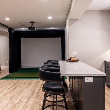 Shawnee, KS Basement Remodel with Custom Bar & Golf Simulator