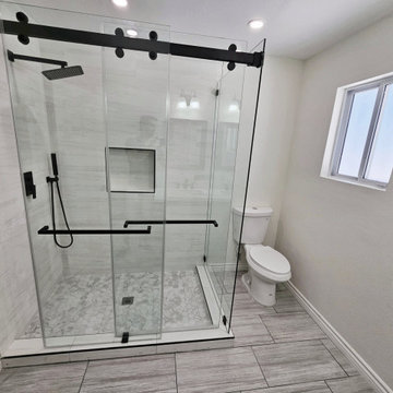 Elegant Walk-In Shower with Matte Black Accents in Irvine Master Bath