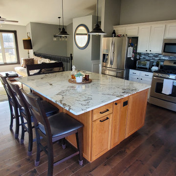 New island with granite top and hardwood
