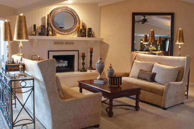 Inspiration for a mid-sized transitional formal and enclosed carpeted living room remodel in Wichita with beige walls, a standard fireplace, a wood fireplace surround and no tv