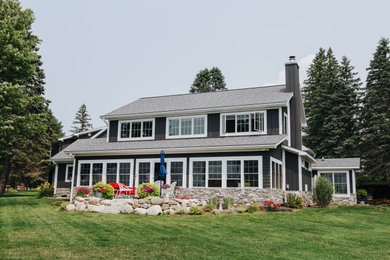 Example of a farmhouse exterior home design in Other