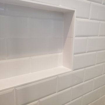 Clean White Tile and Built-In Niche in Laguna Hills Bathroom Remodel