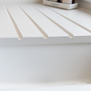 Slab and Shaker Doors in the Same Kitchen? Some rules almost beg to be broken.