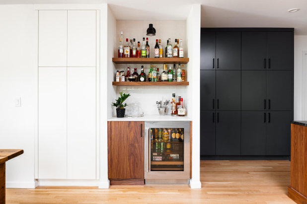Contemporary Home Bar by Four Brothers Design + Build