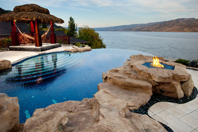 Example of an island style infinity pool design in Vancouver