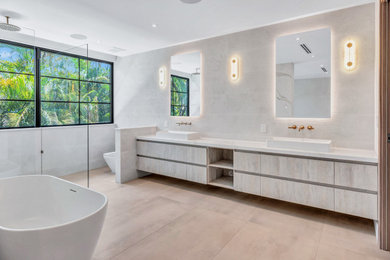 Large minimalist double-sink bathroom photo in Miami with quartz countertops