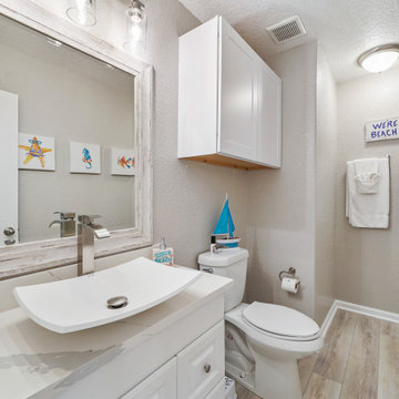 Coastal Home Featuring "Castaway Oak" CALI Vinyl flooring.