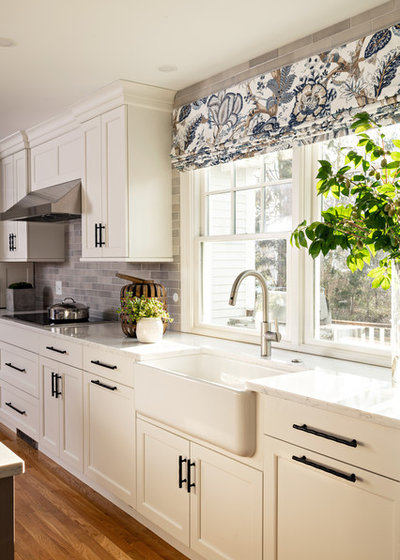 Transitional Kitchen by Roomscapes Cabinetry and Design Center