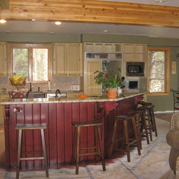 Red Island Refinish with Oak to Beige Kitchen Cabinetry with Heavy Distressing