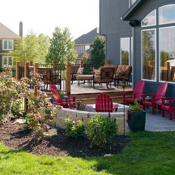 Lamb - Cedar deck in KC with stamped concrete patio.  Firepit.
