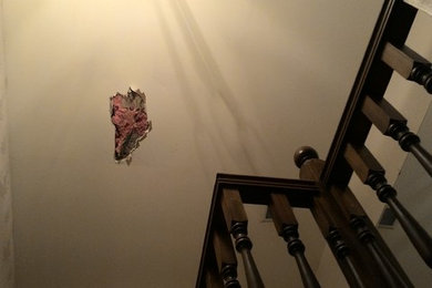 Elegant staircase photo in Indianapolis