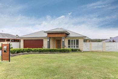 This is an example of a contemporary exterior in Newcastle - Maitland.