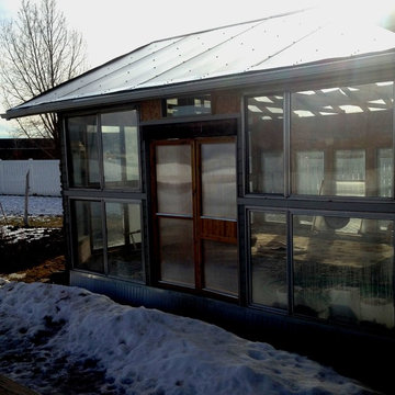 Attached greenhouse for an extended growing season