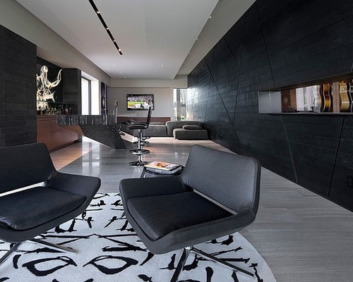 Modern Home Bar Las Vegas Example of a large minimalist single-wall seated home bar design in Las Vegas with