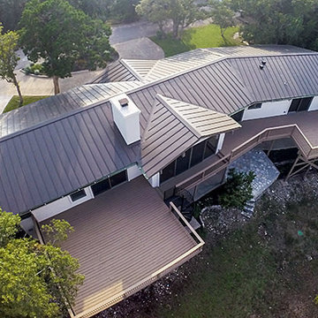 Home with Metal Roof & Deck Installation