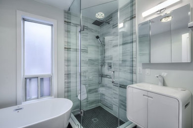 Example of a transitional bathroom design in Other
