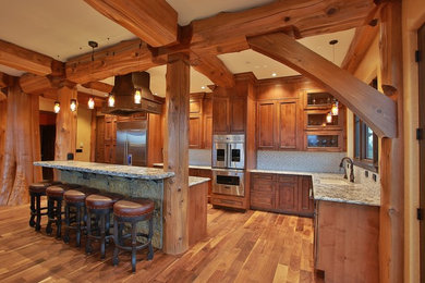 Home design - large rustic home design idea in Other