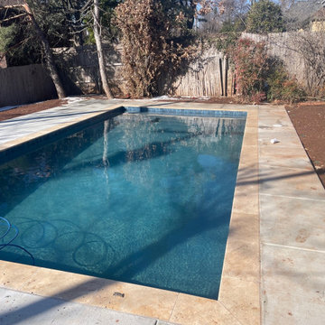 Small Concrete Pool with Travertine Coping