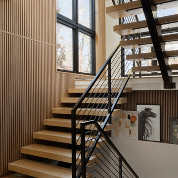 Modern Floating Staircase with Wood Slat Walls