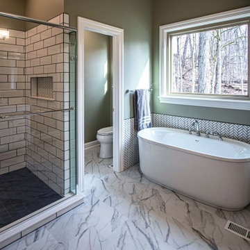 Serene Master Bath with Free Standing Tub, Tiled Shower and Linen Closet