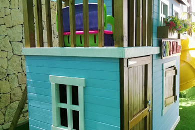 Island style patio photo in Other