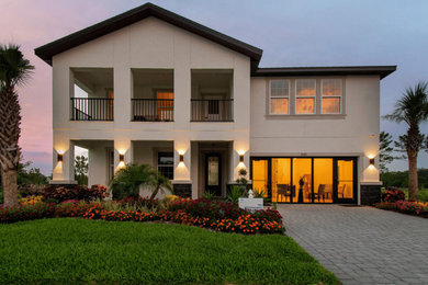 Transitional two-story exterior home idea in Tampa