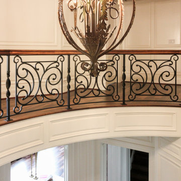 Project #74 | Circular Staircase with Hand-Forged Metal Panels