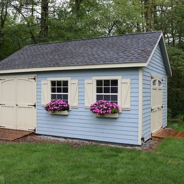 Storage Building with Vinyl Siding and Shingled Roof