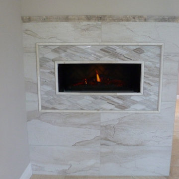Electric fireplace (Down Master Bathroom)