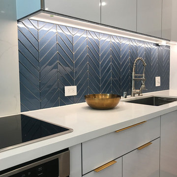 A minimalist kitchen with touch of gold