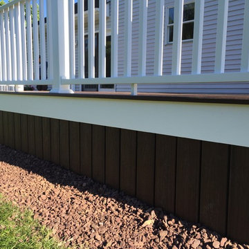 Trex Transcend decking, Picture frame, white trim, vinyl railings