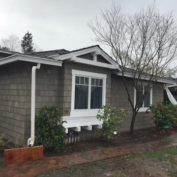 white painted gutter, white trim and white exterior window frames
