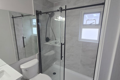 Mid-sized minimalist master bathroom photo in Vancouver with a built-in vanity