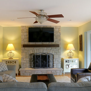 Small contemporary open concept family room in Chicago with a standard fireplace and a stone fireplace surround.