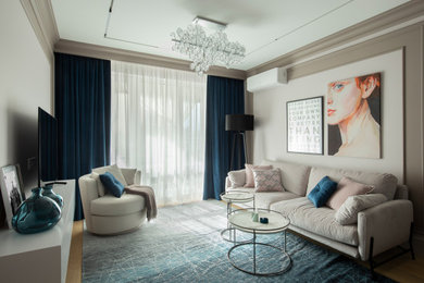 На фото: гостиная комната среднего размера в стиле неоклассика (современная классика) с паркетным полом среднего тона, зоной отдыха и бежевым полом