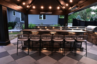 Example of an arts and crafts patio design in New York