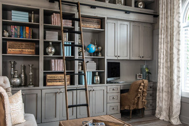 Example of a mid-sized cottage chic built-in desk porcelain tile study room design in Detroit with gray walls