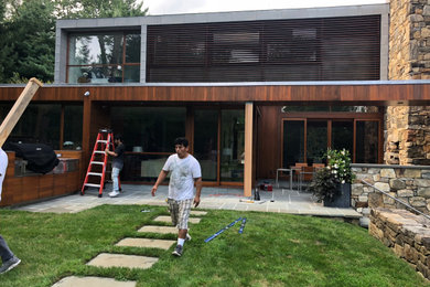 Example of a minimalist exterior home design in New York