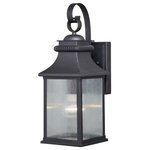 Vaxcel - Cambridge 6" Outdoor Wall Light Oil Rubbed Bronze - The Cambridge collection is the perfect blend of traditional and upscale class. Its updated lantern lines are highlighted in oil rubbed bronze and wrinkle glass panes. Ideal for your porch, entryway, garage, or any other area of your home. Dusk to dawn photo cell automatically turns fixture on in the dark and off in the light for added safety and security, saving energy during daylight hours.