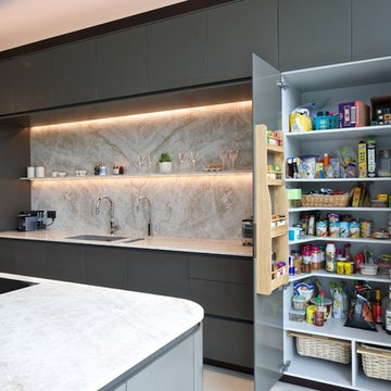 Kitchen in polished Corian, Taj Mahal Granite and Wenge