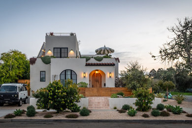 Mediterranean exterior home idea in San Diego