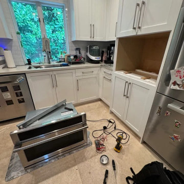 Wall oven repair in Miami — built-in oven pulled out of the cabinet