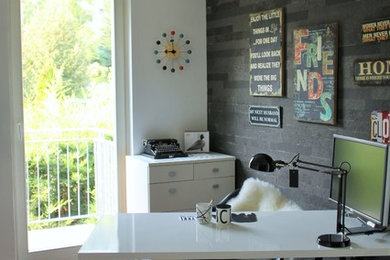 Example of an urban home office design in Other