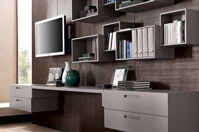 Diseño de sala de estar contemporánea con televisor colgado en la pared