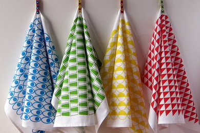 The Dasherie Tea Towels - four patterns in four colours, the full set of sixteen