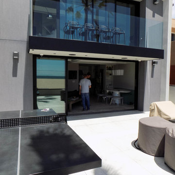Beach House Motorized Power Screen in Newport Beach, California
