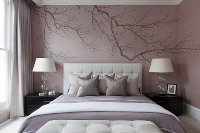 Design ideas for a transitional bedroom in London with purple walls and no fireplace.