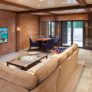 ミネアポリスのラスティックスタイルのおしゃれな地下室 (半地下 (ドアあり)、茶色い壁、スレートの床) の写真