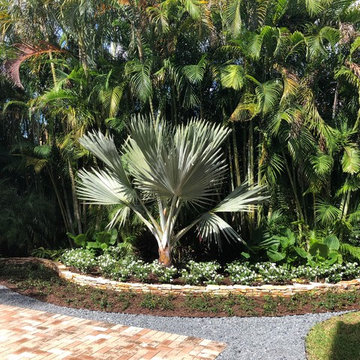 After - Stacked Stone Border Wall with New Landscape